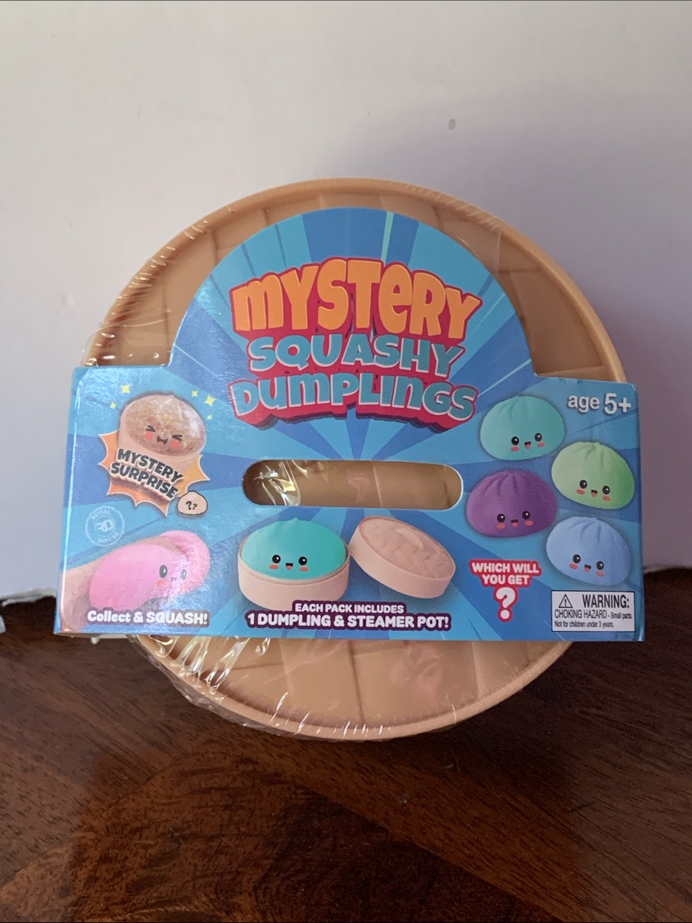 Mystery Squashy Dumplings Kids Toy - Tan Steamer Pot with Blue Packaging